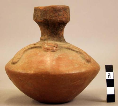 Pottery jar, handle on side, red, with incised ornament