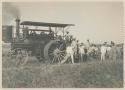 Filipino men with steam plow on Government Rice Farm