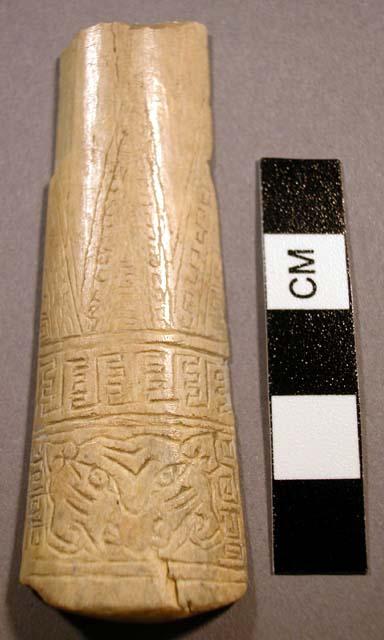 Small piece of bone with incised design