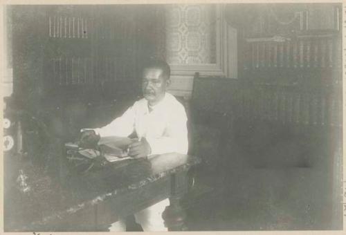 Señor Cayetano Arellano in his library