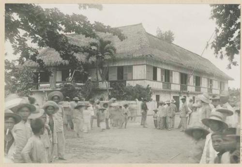 People in front of building in which Commission was entertained