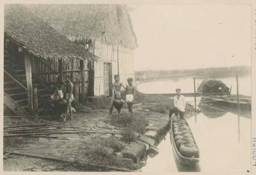 Men bringing sap to distillery in earthen jars