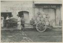 Men with carabao delivery cart