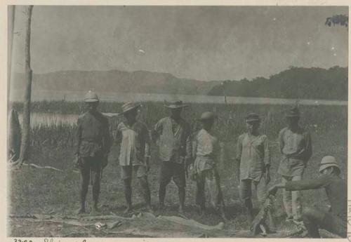 Men with skin of large crocodile