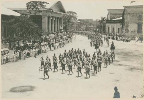 Regimental band and troops escorting Governor Taft