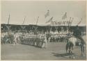 Ameircan policemen marching past grand stand