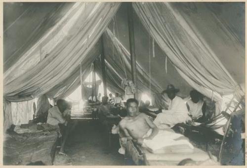 Wounded Filipino men in field hospital at Manila