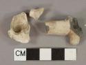 White undecorated kaolin pipe bowl fragment