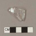 Paneled colorless bottle glass fragment