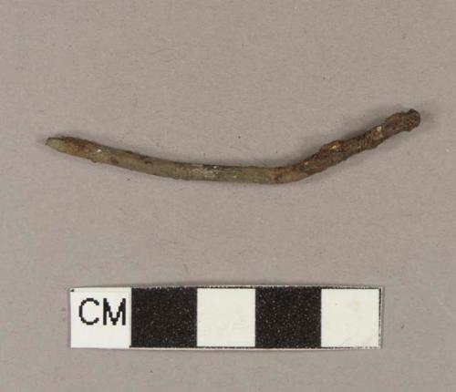 Machine-made iron nail fragment