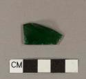 Green bottle glass fragment with layer of white glass