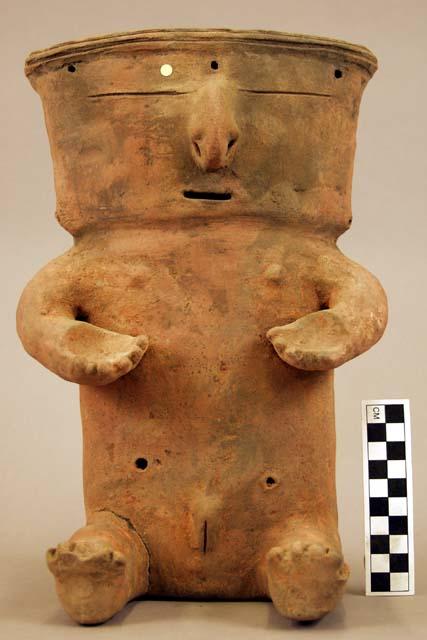 Terra cotta vase, grotesque human form