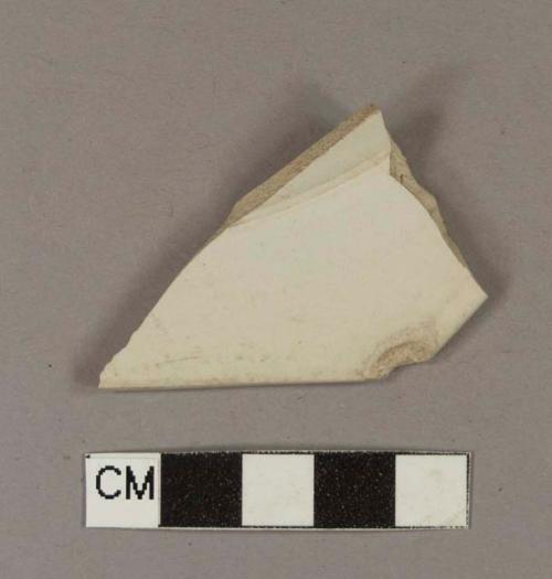 Undecorated white salt glaze stoneware rim sherd