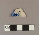 Molded, blue hand painted pearlware rim sherd