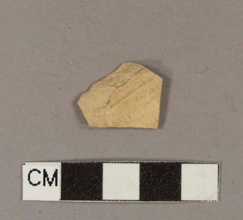 Unidentified unglazed, undecorated refined earthenware body sherd