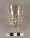 Molded colorless glass stemware fragment