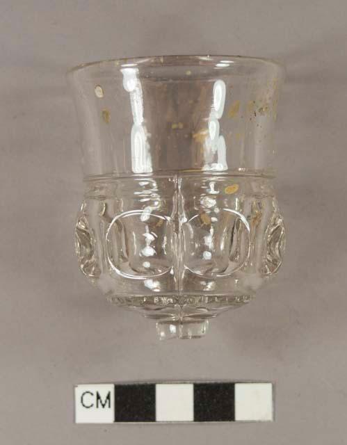 Molded colorless glass stemware fragment