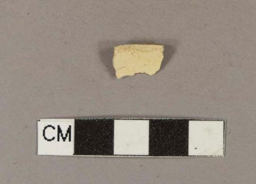 Undecorated creamware footring sherd
