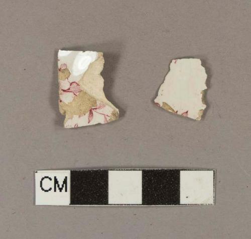 Pink transfer printed whiteware body sherds; two sherds crossmend