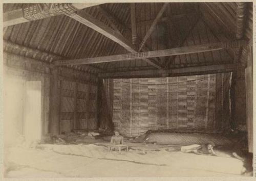 Interior of house with large woven tapestry