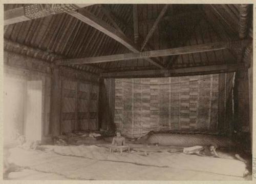 Interior of house with large woven tapestry