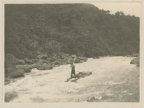 Man rafting down rapids