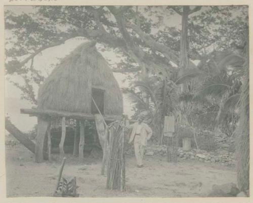 Man in front of sleeping house