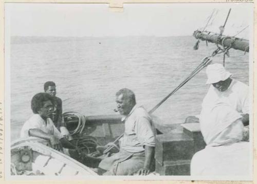 People smoking on boat