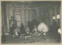 Chief of Nalulakula and two other men sitting inside house