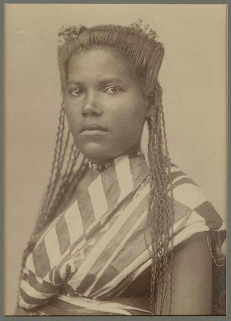 Studio portrait of young woman