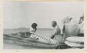 People smoking on boat