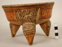 Tripod polychrome pottery bowl, leg broken