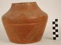 Murillo Applique pottery incised jar, small bowl as cover