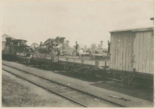 Loading 3-2/10 inch gun on train at Caloocan during fight