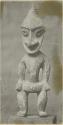 Carved wooden statuette