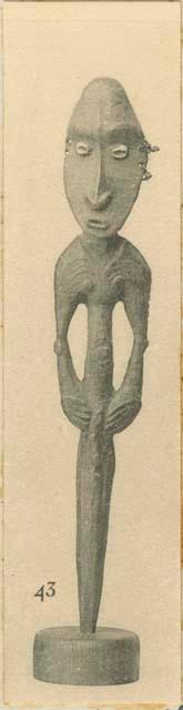 Carved wooden statuette