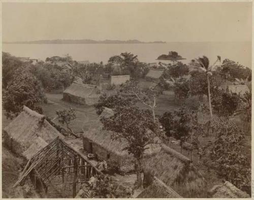 Group of buildings, with shore in background