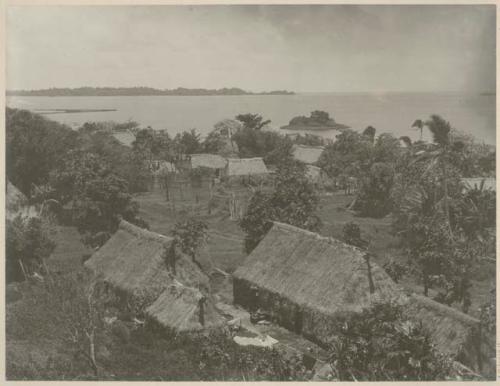 Group of buildings, with shore in background