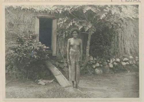 Woman in front of building