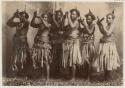 Group of meke dancers holding clubs