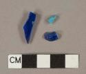 2 cobalt glass fragments, 1 light blue glass fragment