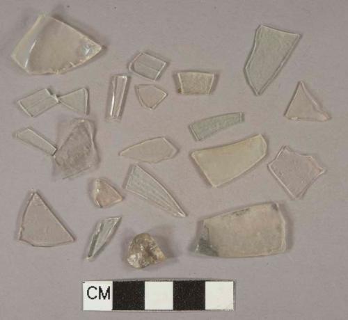 Colorless glass vessel body and base fragments