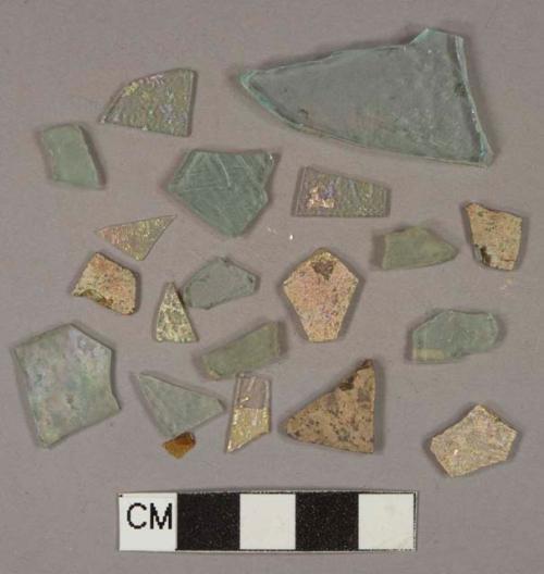 Aqua flat glass fragments, some heavily patinated