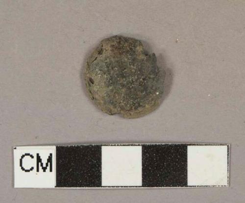 Metal alloy fragment, possible cap