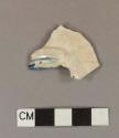 Molded, blue hand painted pearlware rim sherd