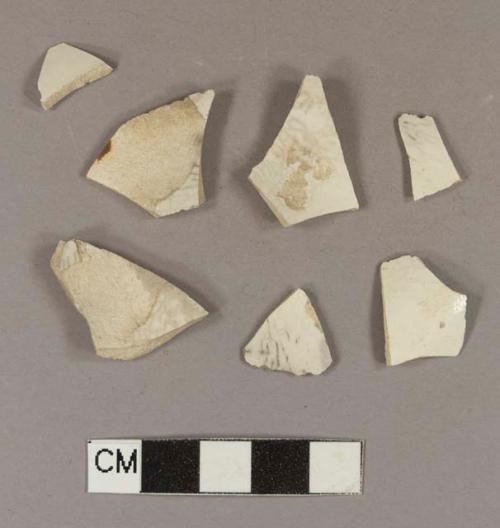 Undecorated whiteware body sherds; three sherds crossmend; three sherds crossmend