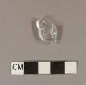 Colorless bottle glass fragment, etched with "...OD..."