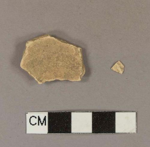 Tin glaze earthenware body sherds, missing all glaze