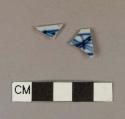 Blue hand painted pearlware rim sherds; two sherds crossmend