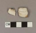 Smoked, molded pipe bowl fragments; two fragments crossmend